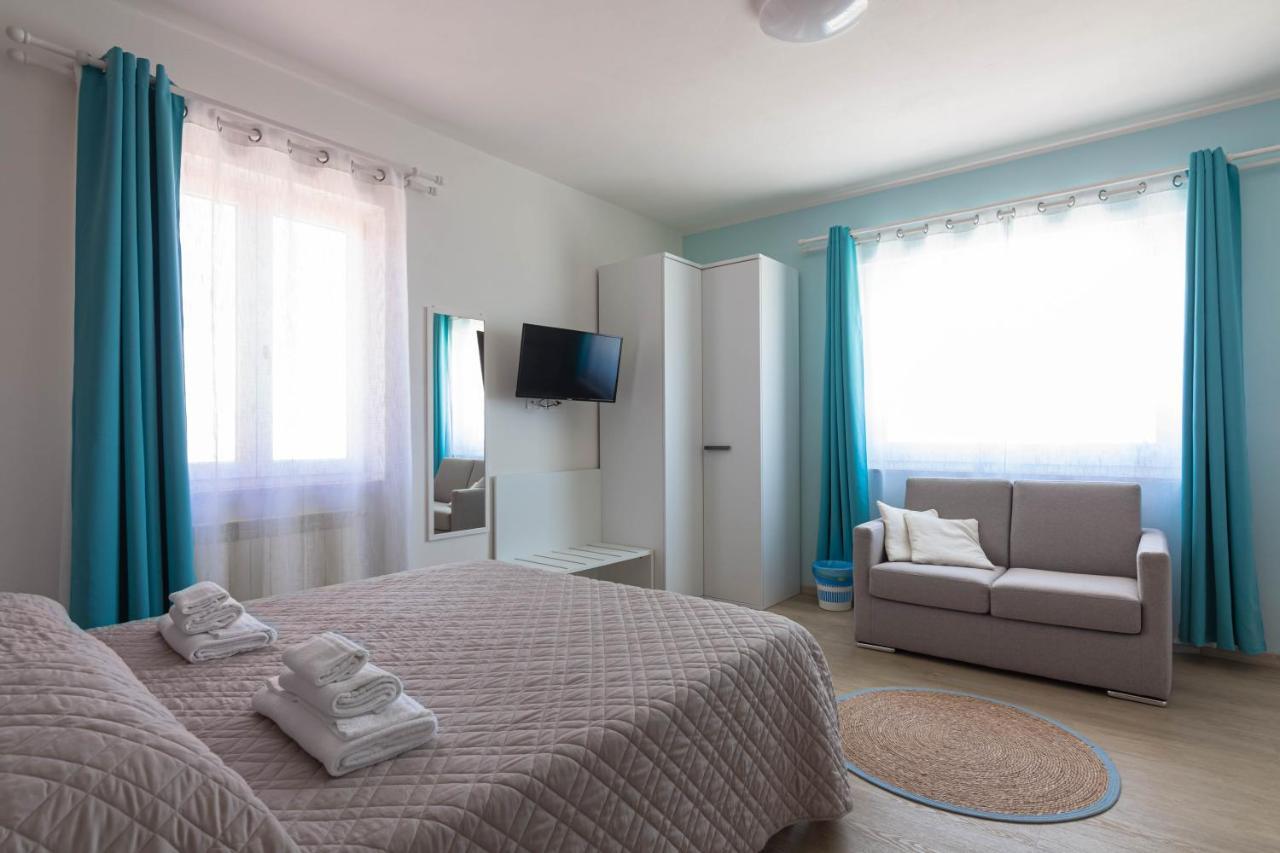 Roccabianca Rooms & Studios Stintino Bagian luar foto